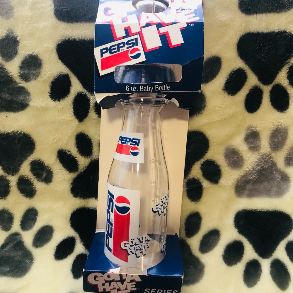 Munchkin Clear Baby Bottle with Blue and Red Pepsi Design